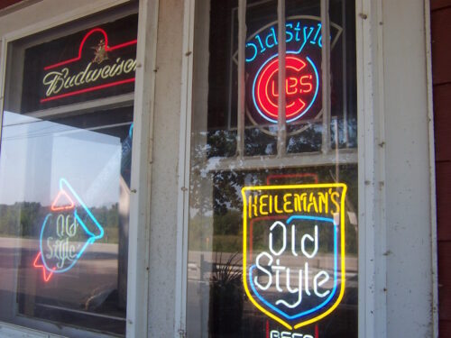 The Wooden Nickel, almost within sight of Illinois, features Wrigley Field’s beers. These signs change dramatically as you continue north on Highway 32.