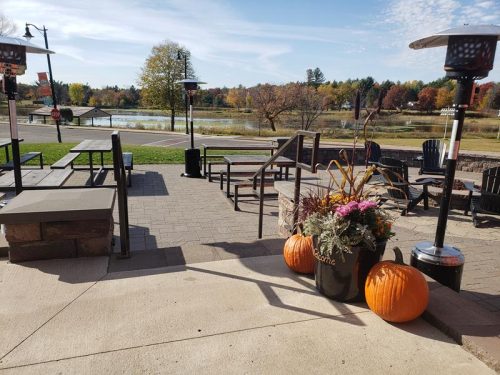 Outdoor patio overlooking Memory Lake at Brickfield Brewing Company, Grantsburg, Wisconsin
