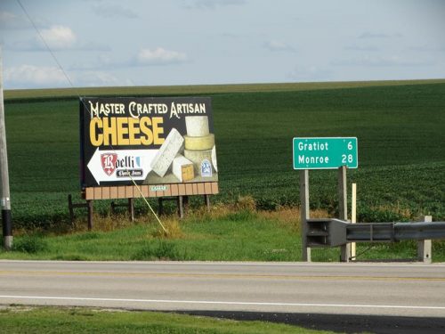 Signs guide you to Roelli Cheese Haus along Highway 11 near Shullsburg and the intersection with Highway 23