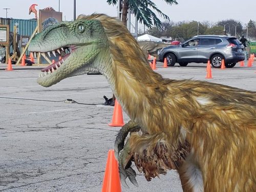 A dinosaur with somewhat of an 80s look at Dino Safari, a drive-thru adventure in West Allis, Wisconsin