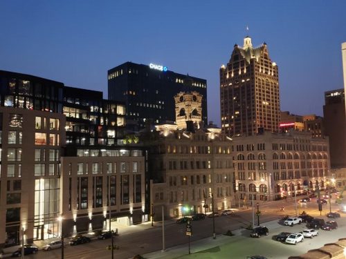 View of downtown Milwaukee looking northwest from the Central Standard Distillery rooftop. Broadway - Highway 32 southbound - is the street below. U.S. 18 also turns from Broadway to Michigan Avenue at the intersection