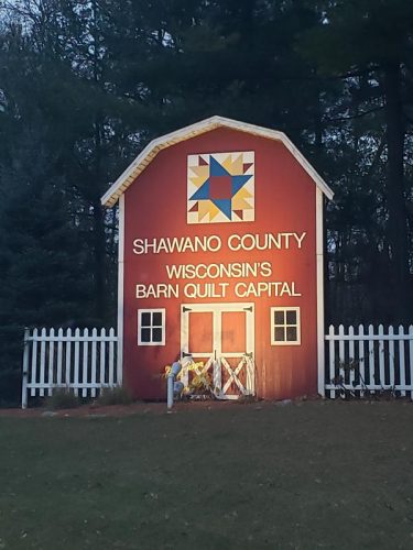 Highway 22 entering Shawano just north of Highway 29, reminding you Shawano County is Wisconsin's Barn Quilt Capital