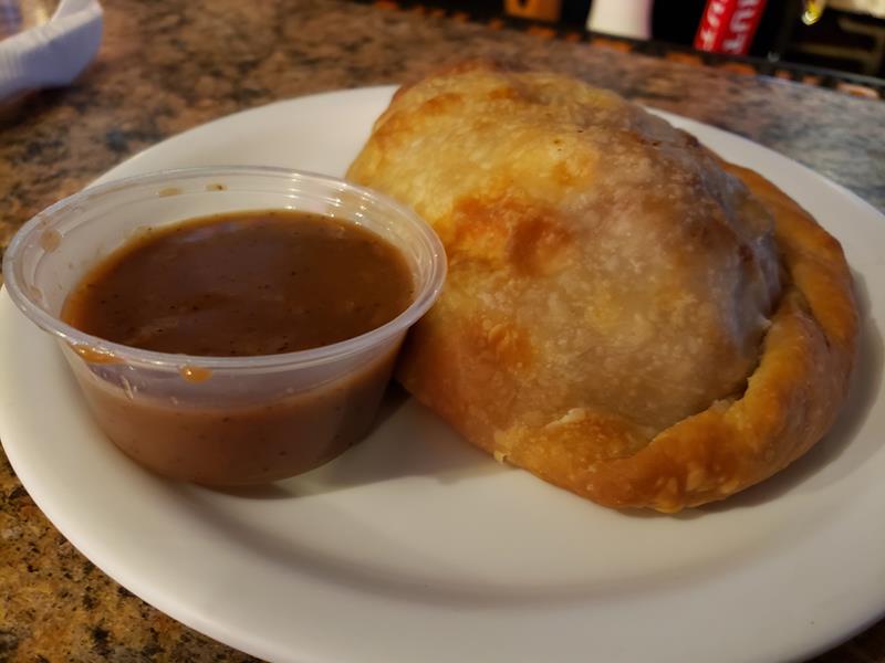 Pasty with a side of gravy (yes, we know, many prefer ketchup) at the Sheboygan Pasty Company, inside the Four of a Kind Bar and Grill in Sheboygan, Wisconsin