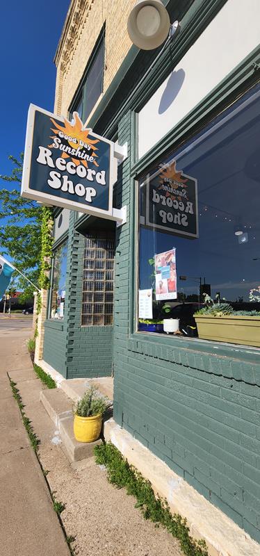 Good Day Sunshine Record Shop in Marshfield, Wisconsin, along Central Avenue (Business Highway 13) in the downtown district right by today's Highway 13 Throughpass and Highway 97's start.
