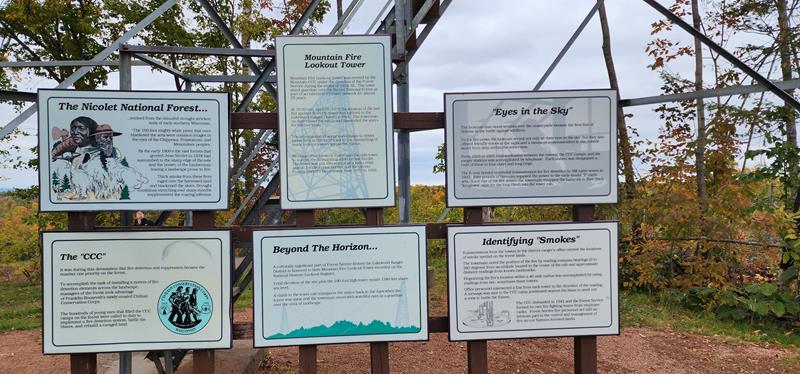 Guide signs at Mountain Fire Lookout Tower outside Mountain, Wisconsin