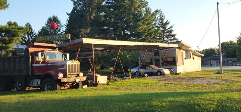 The former Country Drive-In, which closed in 1971, along the old route of Highway 16 at Ski Slide Road in Oconomowoc, Wisconsin