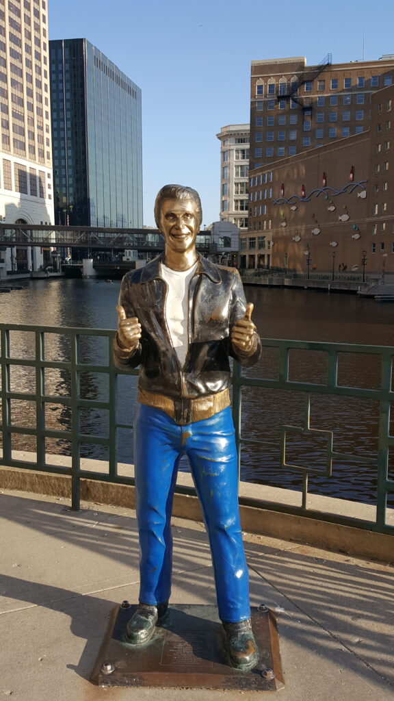 Bronze Fonz statue along U.S. 18 at the Milwaukee River in Milwaukee, Wisconsin
